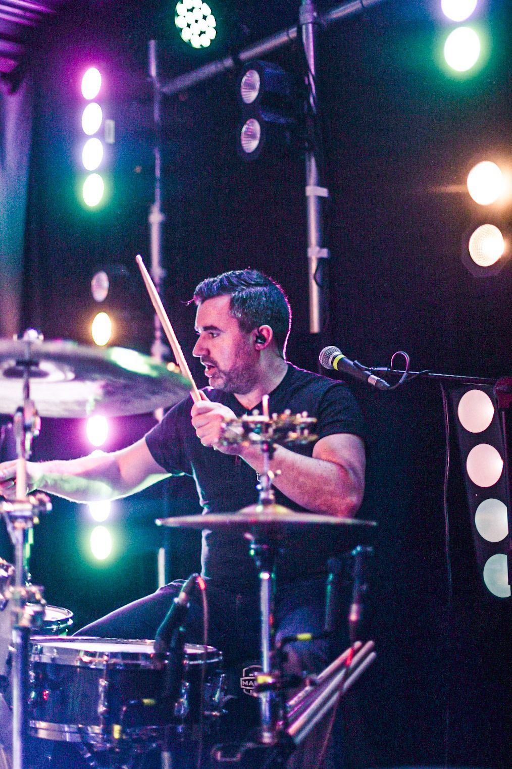 Jon performing on drums